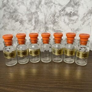 7 Vintage Glass Spice Apothecary Jars With Orange Stoppers  Made in Japan